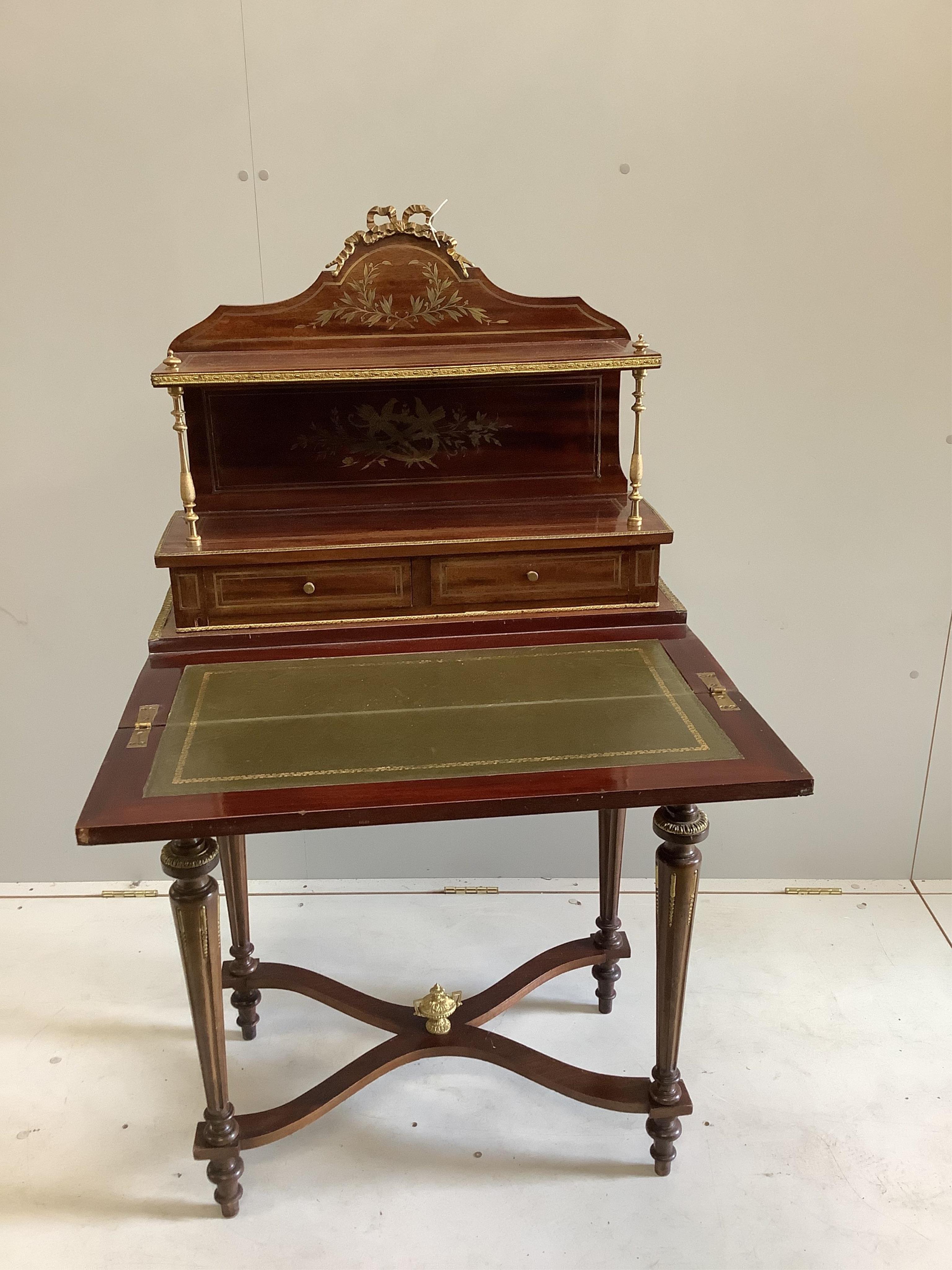 An early 20th century French brass inlaid mahogany bonheur du jour, width 70cm, depth 44cm, height 128cm